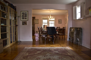 The Alteins’ youngest daughter wanders through the living room. Photo by Alyssa Kramer